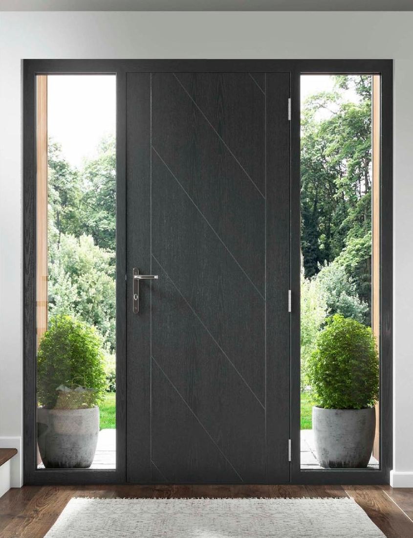 A grey contemporary composite front door with glass side panels