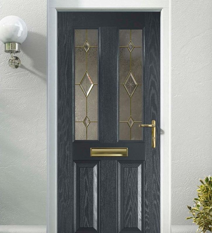 An anthracite grey composite door with decorative glass